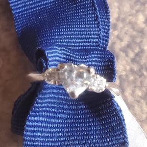 Heart shaped and two accessory clear stone ring